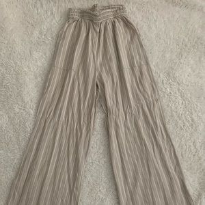 Fit and flair cream and white pants.